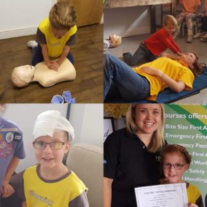 picture of children doing first aid course