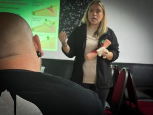 director heather bird teaching first aid at work course near me holding a catastrophic bleeding wound What causes seizures and are they harmful?